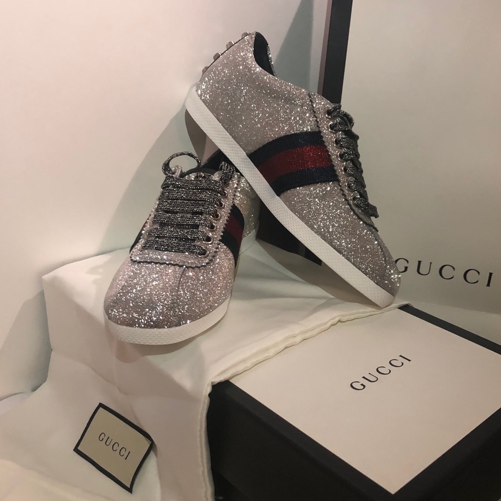 Gucci metallic silver sneakers.